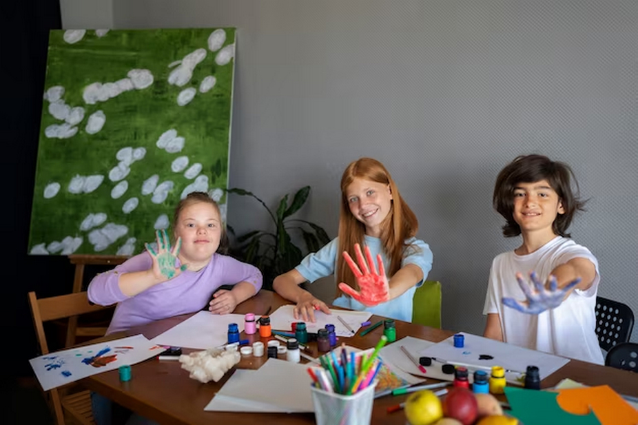 Three children painting