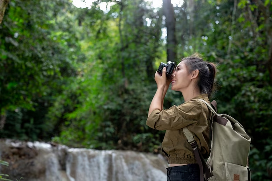 female using camera