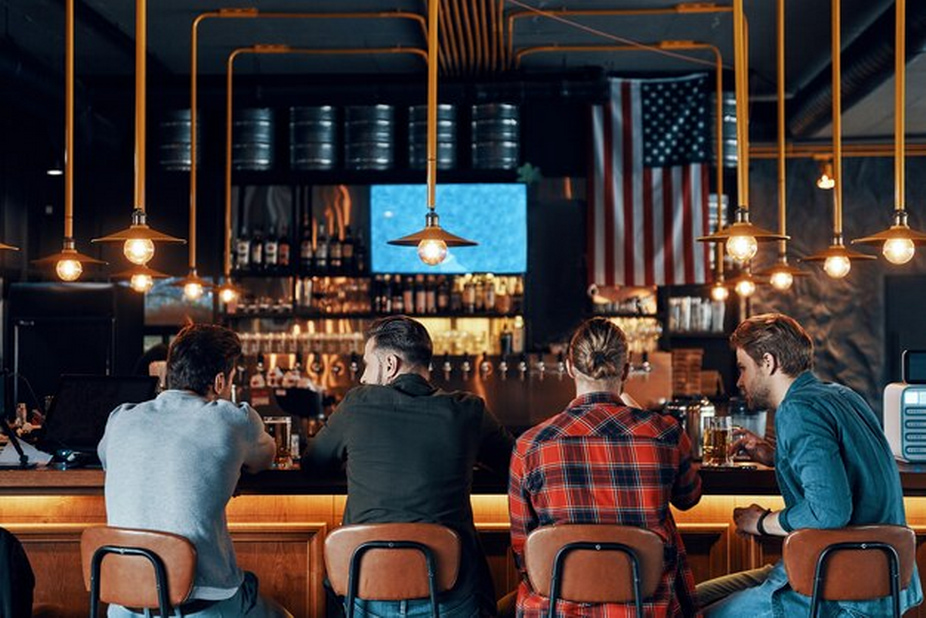 Men enjoying beer at the bar