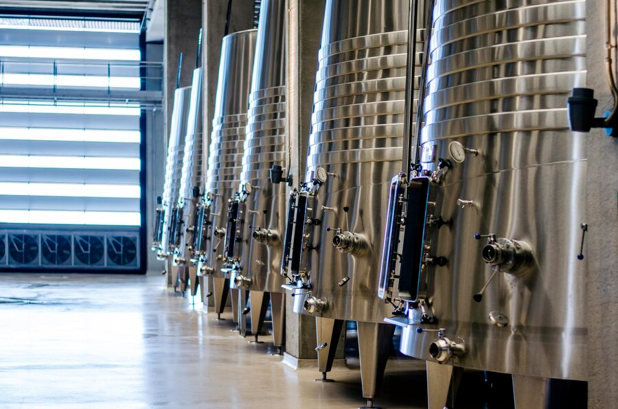 modern winery with big steel barrels